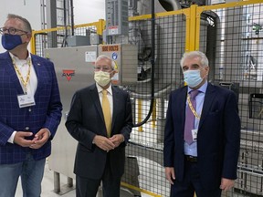 Brantford-Brant MPP Will Bouma (left), Vic Fedeli, Ontario Minister of Economic Development, Job Creation and Trade, and Franco Veglio, CEO of Grissin Bon, on Wednesday tour the company's $6-million addition to its Roy Boulevard plant.