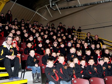 Players in the Kids Christian Hockey League pose at the Brockville Memorial Centre in March 2016 with the new jackets they were given to mark the league's 20th anniversary. Organizers Randy Hopkins and Paul Armstrong have retired, bringing an end to the Brockville-area program.
File photo/The Recorder and Times