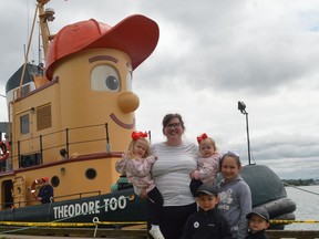 Posing in front of Theodore Too in Prescott on Friday morning: in front, Korbin Connell and Kaiden Connell; back row, Mary Blair Polite, Taylor Polite, Isla Polite and Kendall Connell. The replica of Theodore Tugboat is scheduled to depart for Brockville on Saturday morning and dock in the city until Monday.
Tim Ruhnke/The Recorder and Times