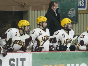 Athens head coach Steve Smith and Aeros players watch the play during a developmental scrimmage with the Brockville Tikis at the Memorial Centre in late 2020. The Athens Jr. B club is slated to hold pre-main camp sessions in Stittsville next month in advance of training camp at Centre 76 on the second weekend of September.
File photo/The Recorder and Times