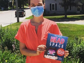 Jennifer Misener holds her book, Head Space, at The Village Store in Athens. Head Space follows main character Brian the Brain as he goes through his day. The book allows children to explore and learn about their own brains.
Submitted photo/The Recorder and Times