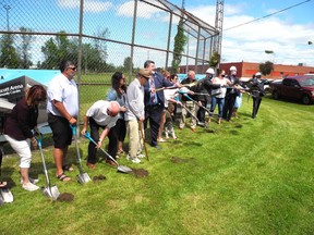 Council members, fundraisers  and dignitaries at the ceremonial ground-breaking for Prescott's new arena and recreation centre.