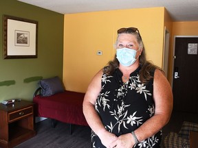 Jody Jarrett, general manager of the new CK Extended Stay at the former Super 8 motel, stands in one of the rooms July 20, 2021. The new operation will be geared towards people transitioning to permanent housing. Tom Morrison/Chatham This Week