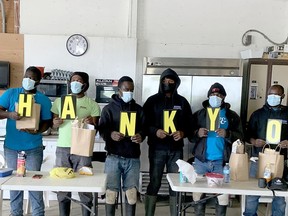 The Migrant Ministry of the Huron County Family of Catholic Parishes recently welcomed migrant workers to the area by providing them with gift bags and thanking them for their work. Above are workers at the Masse fruit and vegetable farm on Zurich-Hensall Road. Handout