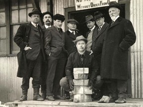 Bickell (centre kneeling) with five gold bars from the McIntyre Mine c. 1912. Courtesy J. P. Bickell: The Life, The Leafs and the Legacy