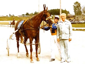 Dennis Jewitt has been involved with the horse racing industry for 60 years and continues to keep busy at Clinton Raceway. In this photograph from 1979, he's shown with Dillon Song, owned by George Barry Elliott. The photograph was taken on Aug. 26. Jewitt marked his 80th birthday on July 24. Handout