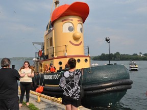 Theodore Too, the official replica of Theodore Tugboat beloved by fans of the television show, docked at the Cornwall harbour on Tuesday July 6, 2021 in Cornwall, Ont. Nno tours were available, but plenty of people came down to have their photos taken with the famous craft. He’s on his way to his new home in Hamilton. Francis Racine/Cornwall Standard-Freeholder/Postmedia Network