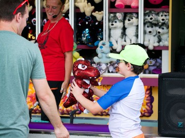 Hundreds attended the Cornwall Ribfest to try midway games, rides, and to taste test pop-up rib shops on Saturday July 24, 2021 in Cornwall, Ont. Jordan Haworth/Cornwall Standard-Freeholder/Postmedia Network