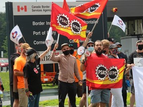 Border Services Officers and union officials during a midday demonstration in Cornwall. Photo on Wednesday, July 28, 2021, in Cornwall, Ont. Todd Hambleton/Cornwall Standard-Freeholder/Postmedia Network
