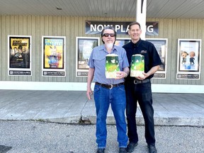Local senior Billy Gibbons and Cochrane Movie House owner Hal Wolf in front of the theatre July 6. Patrick Gibson/Cochrane Times
