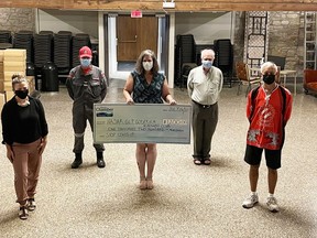 Bruce Power donated $15,000 to the Huron Chamber of Commerce's rapid screening kit distribution intiative. Of the donation, the Chamber allotted $12,000 for non-profits in the area that have supported the initiative. On July 26 the Chamber presented a total of $1,200 to Goderich Little Theatre, Kinsmen Club of Goderich and the Huron and Area Search and Rescue (HASAR). (L-R): Erin Grandmaison, Bruce Power; Tom Sorenson, HASAR; Jennifer Verdam-Woodward, Chair of the Chamber; David Armour, Goderich Little Theatre; Earl Pennington, Kinsmen. Kathleen Smith