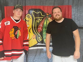 Mitchell Hawks' General Manager Josh Keil (right) formally announced the signing of goalie Tyler Parr, of Stratford, who signed with the Hawks in 2017-18 as a 16-year-old. Now in his overage season, Parr returns along with former Stratford Warriors' Malcolm McLeod and Evan Dowd.