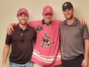 Hanover Barons assistant general manager Thomas Haffner, the team's newest addition, goaltender Riley McCabe, and team general manager Blair Butchart.