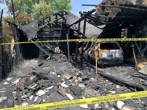 Kingston Police are investigating after the body of a person was found in the debris of a garage fire on Wednesday, July 14, 2021.