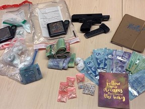 Drugs, cash and drug trafficking paraphernalia seized by Kingston Police when they executed a drug warrant on Wednesday, July 14, 2021 afternoon in Kingston.