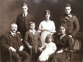 An old family photo, circa 1916, shows some of Susan Young's relatives, including her grandmother, standing in back row.