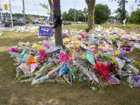 A memorial to the Afzaal family at the corner of Hyde Park Road and South Carriage Road in London, Ont., on Wednesday, June 23.
