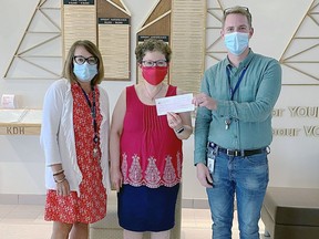 Pictured left to right: Joan Brazeau, Vice President, Clinical Services and Chief Nursing Officer; Judy
Milford, raffle winner; Andrew Brown, Vice President, Corporate Services and Chief Financial Officer.