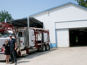 Katie, left, and Justin Levy outside J.T.L. Repairs in Crediton, which specializes in diesel engine repair, but also offers several other services including automotive repair and mobile roadside repair.