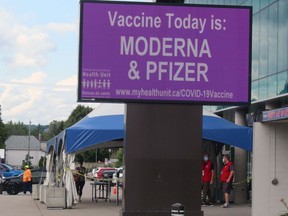 Staff at Memorial Gardens wait as a person arrives for a COVID-19 vaccine at the clinic.
Nugget Photo