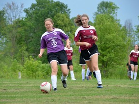 In this 2021 file photo, Julie Harris, left, of Great Lakes Pilots and Allyson Morris of D.C. Taylor Jewellers take part in girls Under 18 play as the Owen Sound Minor Soccer season kicked off at the Kiwanis Soccer Complex Monday after the 2020 season was cancelled due to COVID-19. Rob Gowan/The Sun Times
