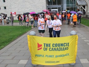 On Canada Day, the Kitchissippi-Ottawa Valley Chapter of the Council of Canadians held a respectful presence on Algonquin territory to to promote community education about the experience of Indigenous Peoples at Indian Residential Schools and to honour the spirits of missing Indigenous children. Participants gathered at the Renfrew County Courthouse before marching down Pembroke Street to the bridge.