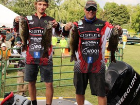 Jacob Simiana (left) and his dad John showed off part of their catch during the 2018 Battle of the Bass on the Ottawa River. They took first place with a catch of 18.66 pounds of bass, earning them the $2,000 grand prize.