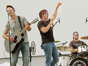 From left, Chris McComb, Chase Kasner and Jordan Potvin of the River Town Saints performed at the Skylight Drive-in last summer. They are returning to Pembroke for a free drive-in style concert at Riverside Park Aug. 7.