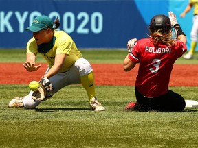 Brantford's Erika Polidori is safe at second base as Canada's Olympic softball team romped to a 7-1 win over Australia on Friday in Yokohama.