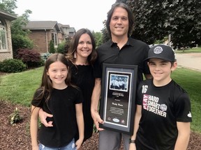 Stratford's Brady Blain was named Alliance Hockey's 2020-21 Coach of the Year. Blain is pictured with daughter Keira, wife Heather and son Owen.