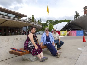 Mary Chivers-Harkins, Katharin Harkins and Patrick Harkins wait Tuesday outside the tent for the first show of the 2021 Stratford Festival season. The opening of this year's season took place exactly 68 years after the very first opening in 1953 and 16 months since the last show in Stratford. Like that first season, this year's performances will largely take place under tents because of the public-health restrictions in place during the COVID-19 pandemic. 

Mike Hensen/The London Free Press/Postmedia Network