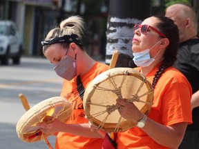 Participants drum during Thursday's March for Our Lost Children held in downtown Sarnia to honour the victims of Canada's residential schools.