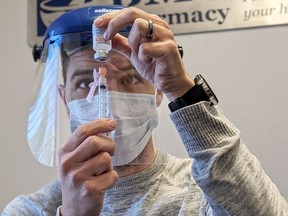 BMC Pharmacy's Darryl Wallis prepares vaccine to be injected at the Sarnia pharmacy. A vaccination clinic at BMC is planned for July 10. (Submitted)