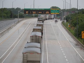 Trucks were backed on the Highway 402 approach to the Bluewater Bridge Thursday morning in Point Edward. Traffic on the bridge crossing the St. Clair River was interrupted as U.S. Customs and Border Protection investigated a vehicle that had been left on the bridge.
