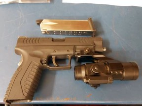 A 37-year-old Sarnia man is facing multiple charges after police say they found a replica handgun in a suspect's waistband in a local motel room on Sunday, July 25, 2021. (Sarnia police)