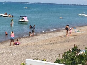 Boats are pictured near the shore at Bright's Grove beach in this file photo.
