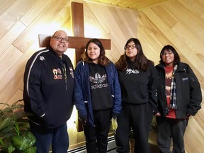 Parry Stelter, left with his wife Angie, far right and their two daughters, are seen here in Wisconsin in 2019, where Stelter spoke about grief, loss and intergenerational trauma. The family welcomes provincial funding to help Indigenous communities search for missing loved ones who attended residential schools. Submitted photo