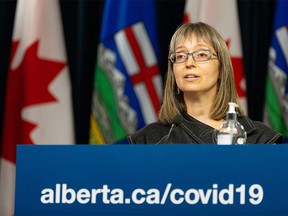 Dr. Deena Hinshaw, AlbertaÕs chief medical officer of health, gives a COVID-19 pandemic update from the media room at the Alberta legislature in Edmonton on Wednesday, July 28.