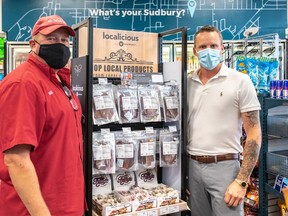 Waypoint Convenience agent Bill Chimchak and Shawn Scott have worked together to promote Scott's product, Local Jerky Plus. Jess McShane photo