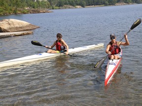 Julien Turpin, left, and volunteer Mateo Volpini participate in a regatta-ready summer program at the Northern Water Sports Centre in Sudbury, Ont. on Monday July 12, 2021. The 10-week program is offered by the Sudbury Canoe Club. John Lappa/Sudbury Star/Postmedia Network