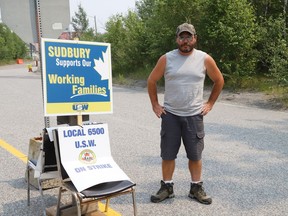 United Steelworkers Local 6500 member Rick Joly pickets at an entrance to Vale's Garson Mine in Garson on July 19.