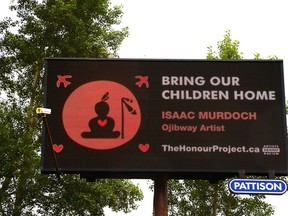Serpent River First Nation artist Isaac Murdoch is participating in a national billboard campaign to raise awareness about residential schools. His work is featured on digital billboards, including this one on Brady Street in Sudbury, Ont. John Lappa/Sudbury Star/Postmedia Network
