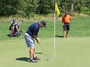 Clyde Hourtovenko putts on the 18th green at the Idylwylde Men's Invitational Golf Tournament at the Idylwylde Golf and Country Club in Sudbury, Ont. on Friday July 23, 2021. The tournament continues with match play starting Saturday and continuing into Sunday, with the final beginning around 1 p.m.