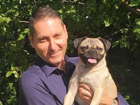 Gilles Gervais cuddles with his dog Kirby. A fundraising campaign has been launched to help the popular Sudbury realtor and Zigs founder in his battle with cancer.