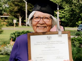 Louise George, 72, of Kettle and Stony Point First Nation, holds her high school diploma. George decided after she retired to finish high school through the adult and continuing education program at the Lambton-Kent District School Board. Handout