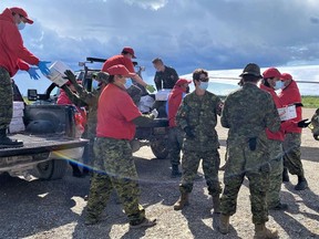 Sgt. Janet Butt supervised a joint team of Canadian Rangers and soldiers during the unloading of cargo aircraft at Kashechewan airport amid the recent COVID-19 crisis.

Supplied/Sgt. Janet Butt