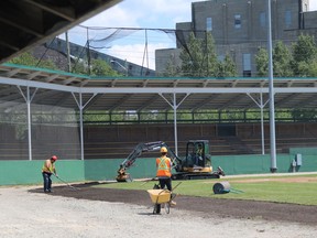 A crew is seen here working at Fred Salvador Field in Hollinger Park on Friday afternoon. Glenn Thurston, the city's manager of parks and recreation, confirmed there will be no baseball played on that field this year.

ANDREW AUTIO/The Daily Press