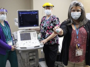 Jade Cashmore, ultrasound student at the Timmins and District Hospital, from left, is seen here with Teresa Bazeley, clinical instructor, and Barb McCormick, hospital foundation's manager of donor relations, with one of the five ultrasound units that are due to be replaced at the hospital. Money for this purchase is being raised through the John P. Larche Charity Golf Classic being held Thursday, Aug. 5 at Spruce Needles Golf Club.

RICHA BHOSALE/The Daily Press