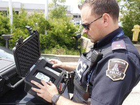Timmins Police Const. Chris Gauthier, was arranging a roadside breath-screening device, which is commonly used by police officers during RIDE spot checks as both TPS and OPP say they will be ramping up enforcement with a focus on road safety this upcoming  long weekend.

RICHA BHOSALE/The Daily Press