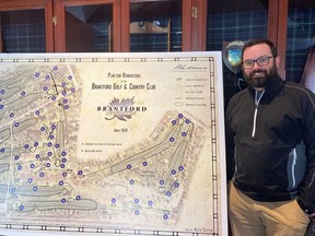 Stephen Hicks, the grounds superintendent at the Brantford Golf and Country Club, stands next to the plan’s for the course’s multi-million dollar renovation.